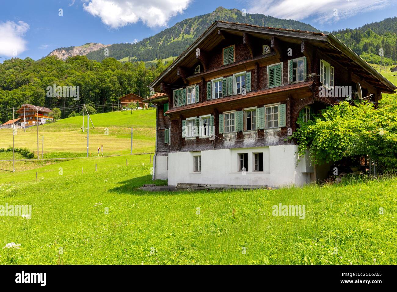 View of the traditional medieval alpine village on a sunny day. Lungern ...