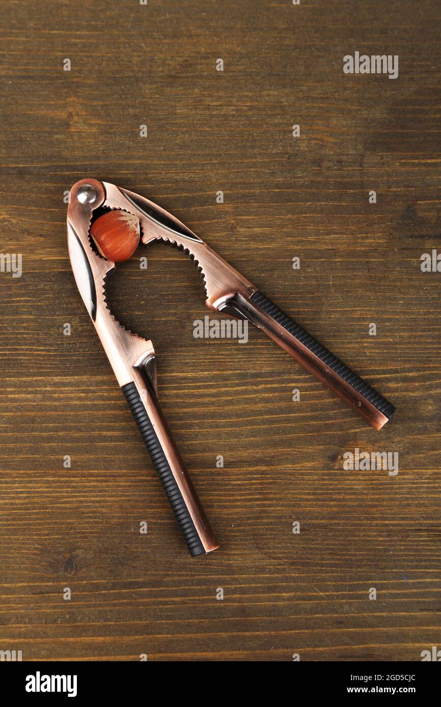 Nutcracker and hazelnut isolated on white background Stock Photo Alamy