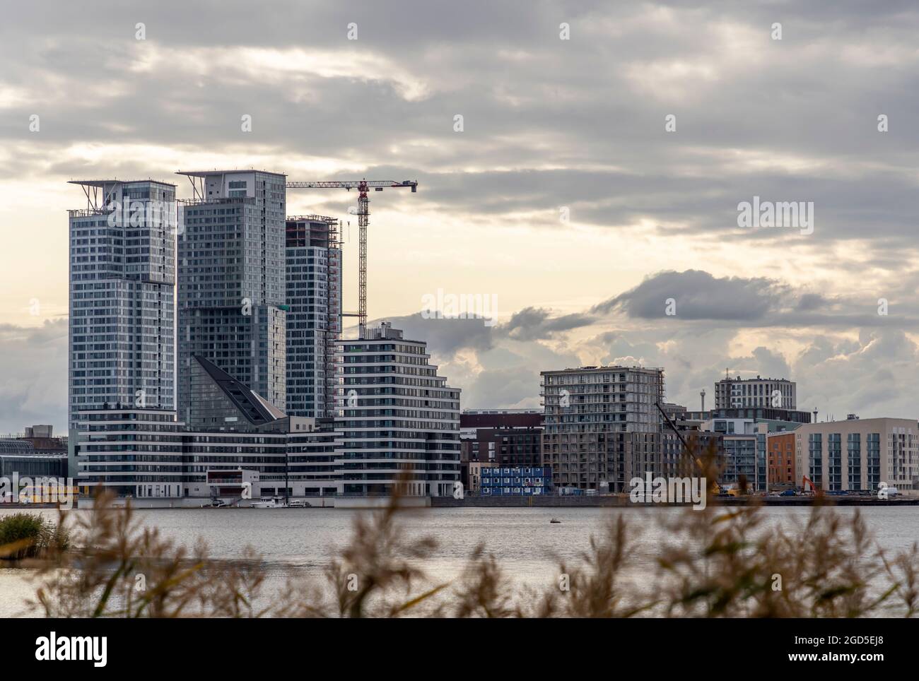 High rise buildings, some still under construction, in Kalasatama. Room for text. Stock Photo