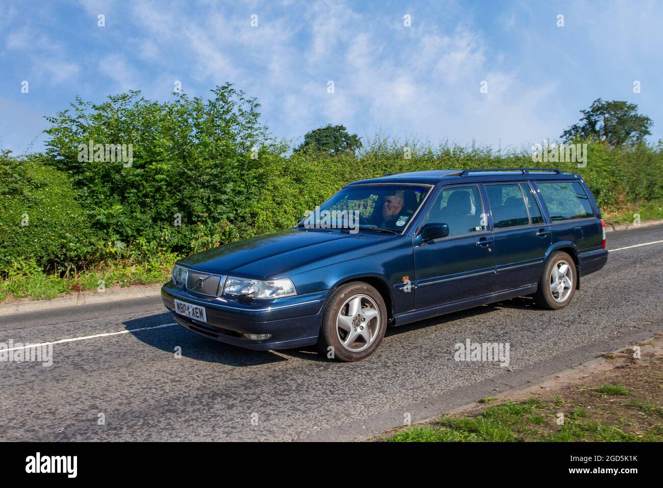 1995 90s nineties blue Volvo 960 S 95 2473 cc estate, en-route to Capesthorne Hall classic July car show, Cheshire, UK Stock Photo