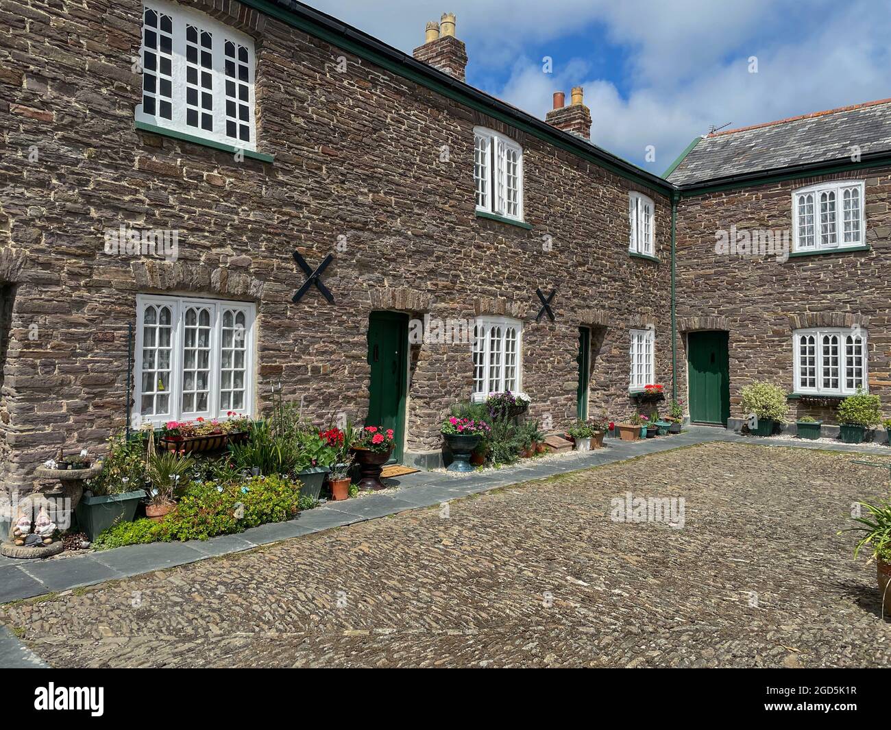 Row of Traditional Victorian Terraced Granite Stone Alms Houses at Salem Square in the North Devon Town of Barnstaple, England, UK Stock Photo