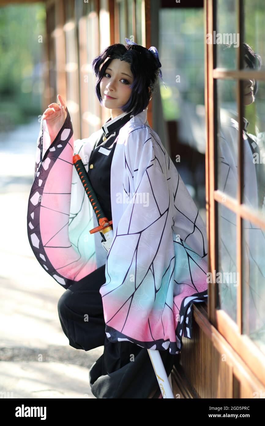 Japan anime cosplay portrait of girl with comic costume with japanese theme  garden Stock Photo - Alamy