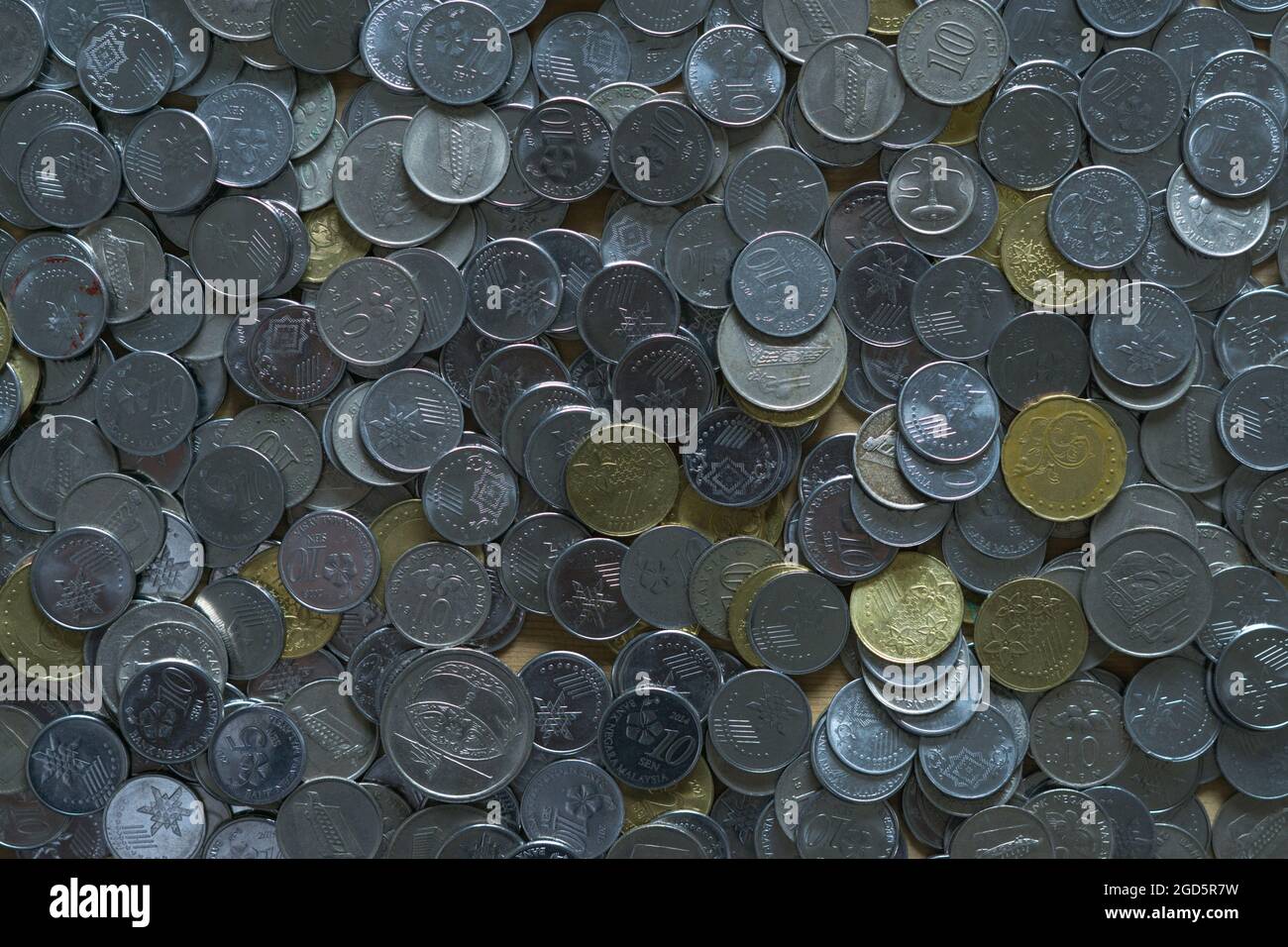 Background of a pile of different Malaysian ringgit coins - Texture of ...