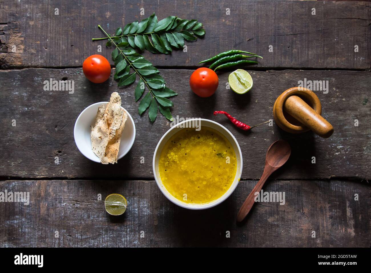 Yellow dal or lentil soup in a bowl. Top view. Stock Photo