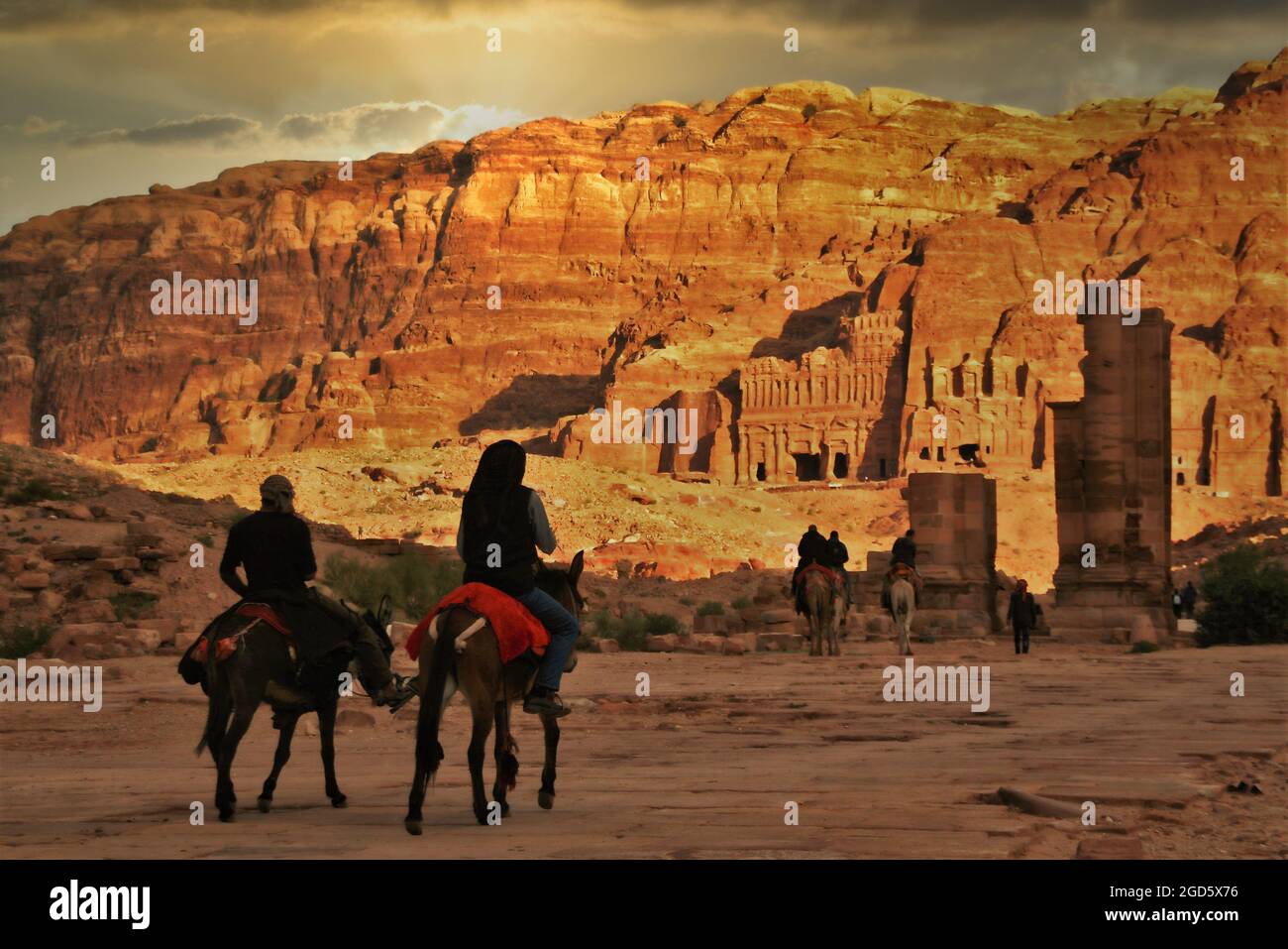 Horsemen in Petra, Jordan Stock Photo