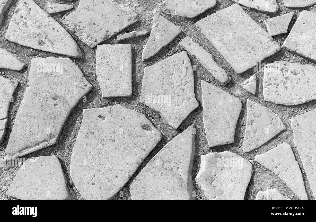 Stone wall made of white natural rough blocks, background photo texture Stock Photo