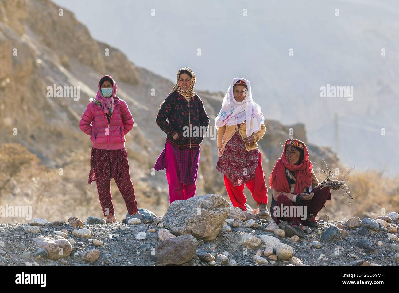 Hunza valley, Pakistan - June 2021: Wakhi women outdoor Stock Photo