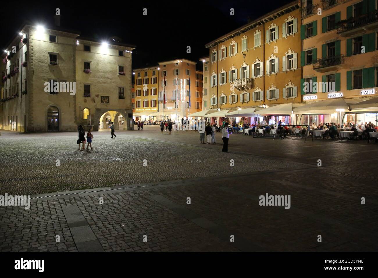 Strolling after dark in Riva del Garda,Italy Stock Photo