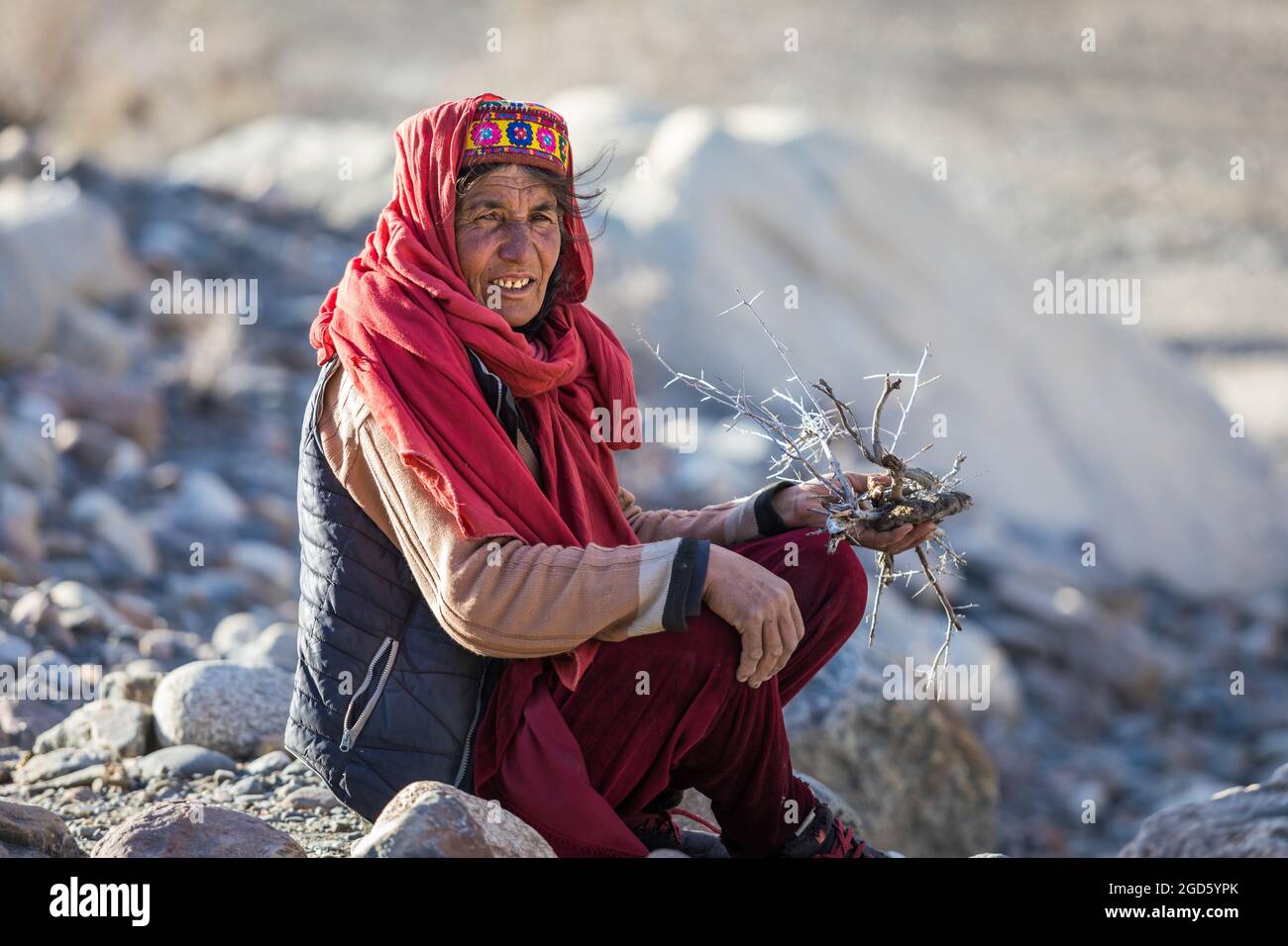 Hunza valley, Pakistan - June 2021: Wakhi woman outdoor Stock Photo