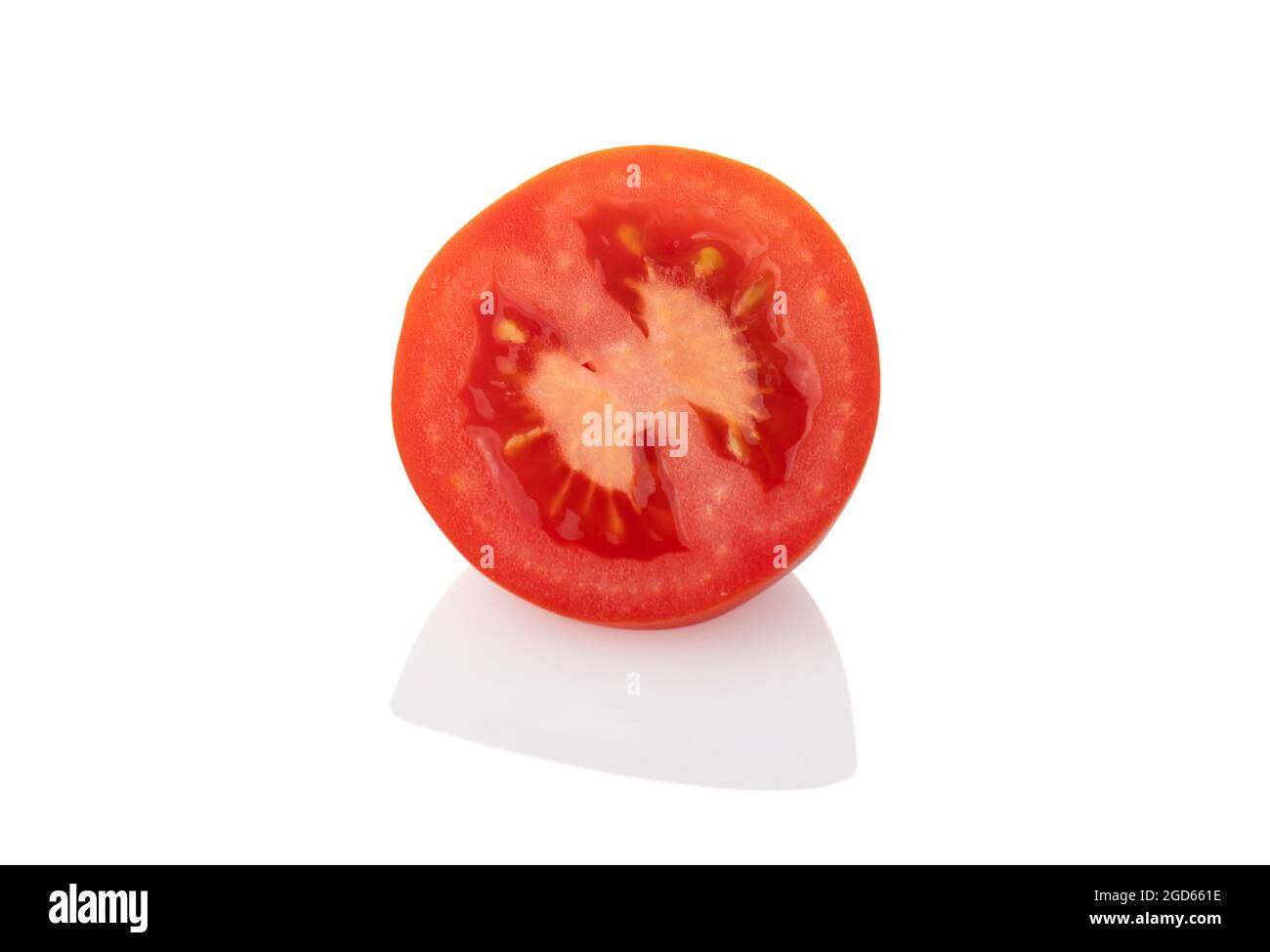 Sliced tomato - Single half tomato on white background Stock Photo