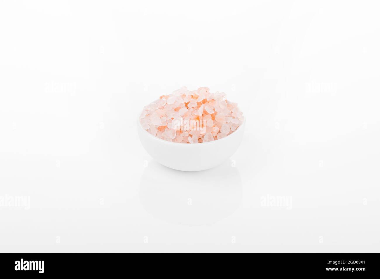Himalayan salt, pink himalayan salt. himalayan salt in white bowl, on