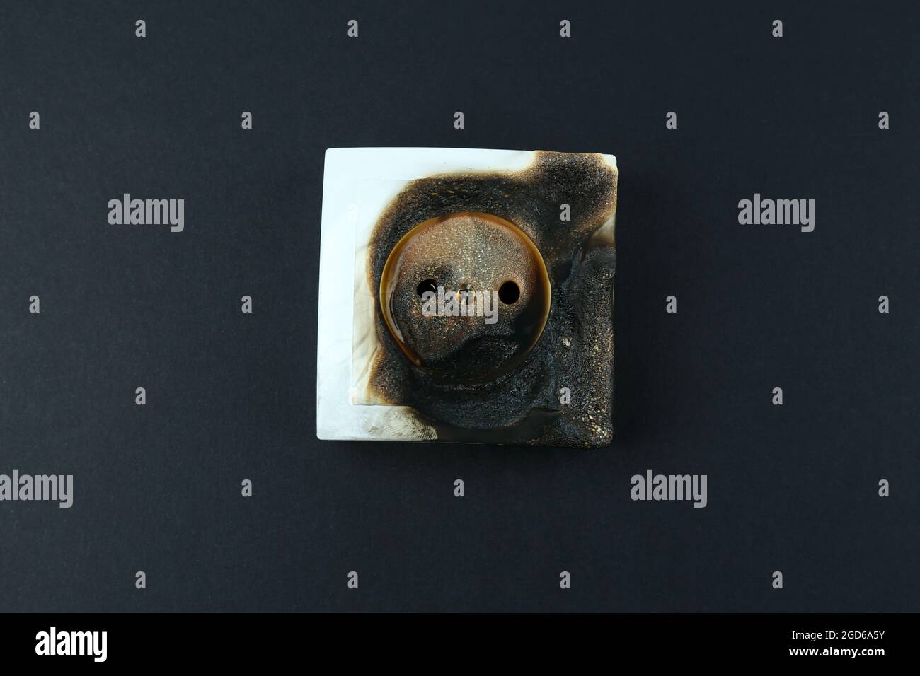 Burned plug socket close up Stock Photo Alamy