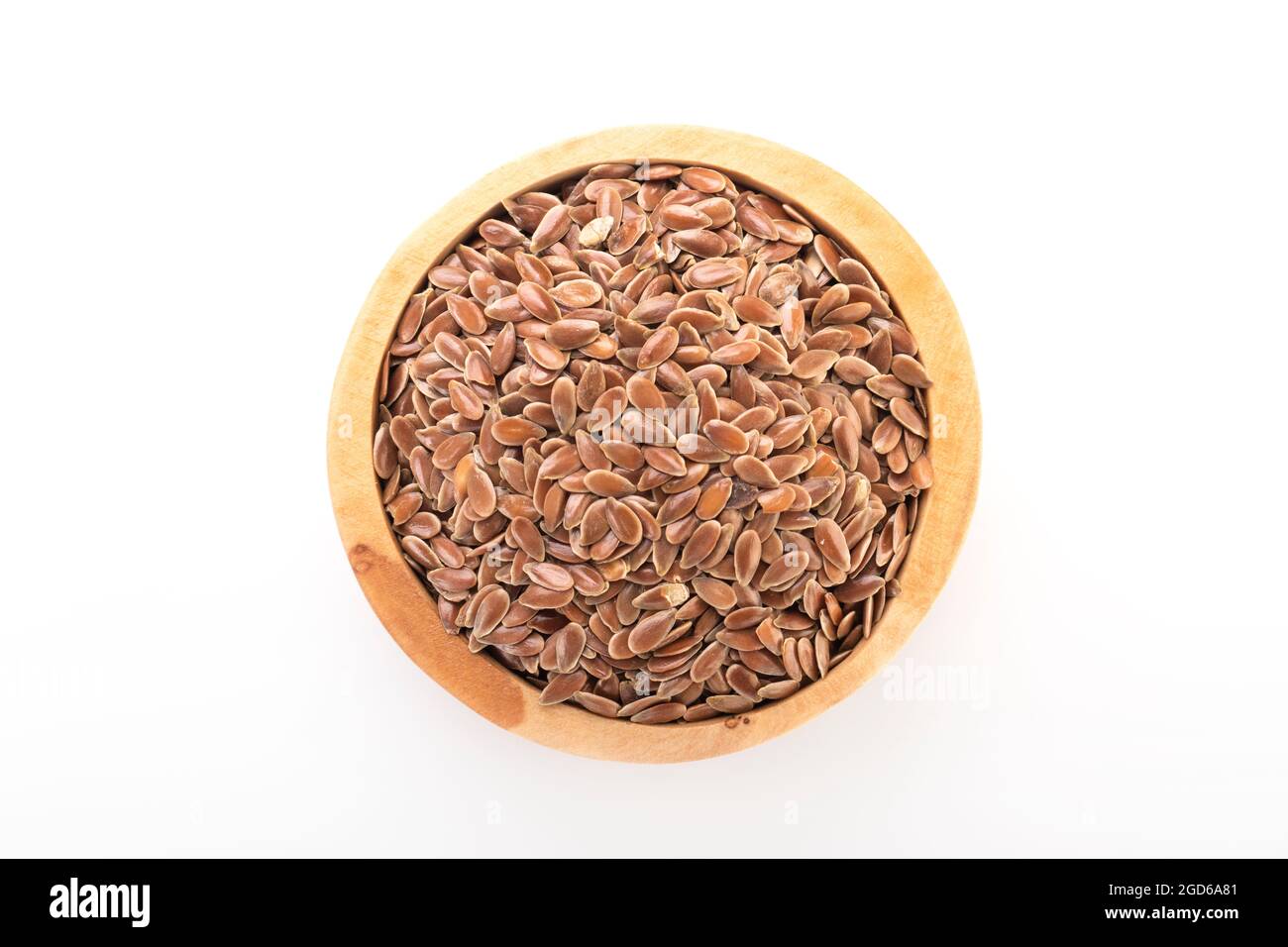 flax seed. flax seed in wooden bowl on white background. flax, seed. macro photo flax seed. Stock Photo