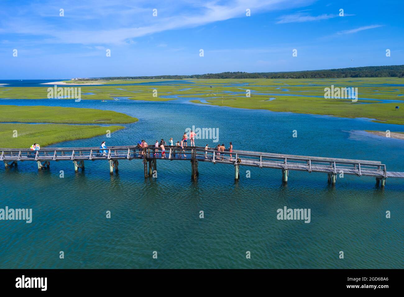 Children jumping of the bridge on Sandwich Boardwalk, Sandwich