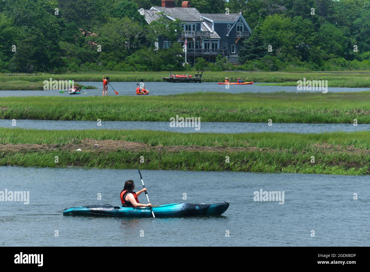 People kayaking in Swan pond river in Dennis port, Cape Cod Stock Photo