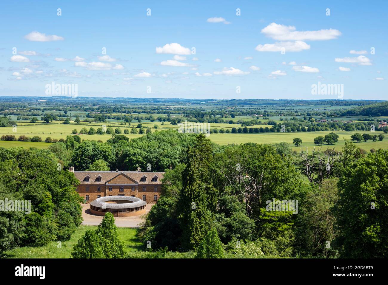 Belvoir Castle tennis courts and stables with a view over the Vale of Belvoir Grantham Leicestershire England UK GB Europe Stock Photo