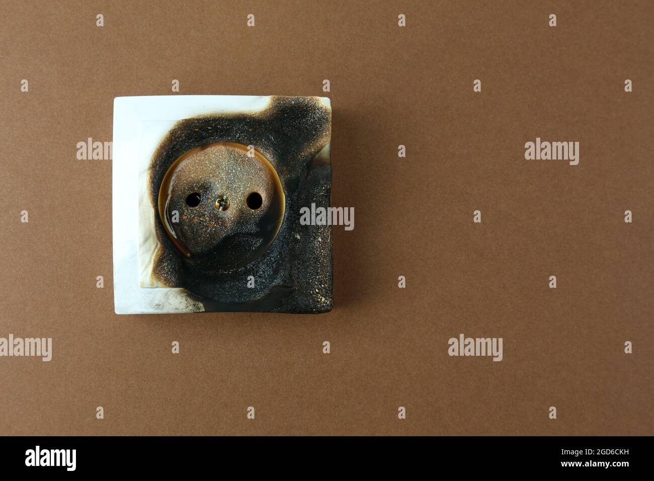 Burned plug socket close up Stock Photo Alamy