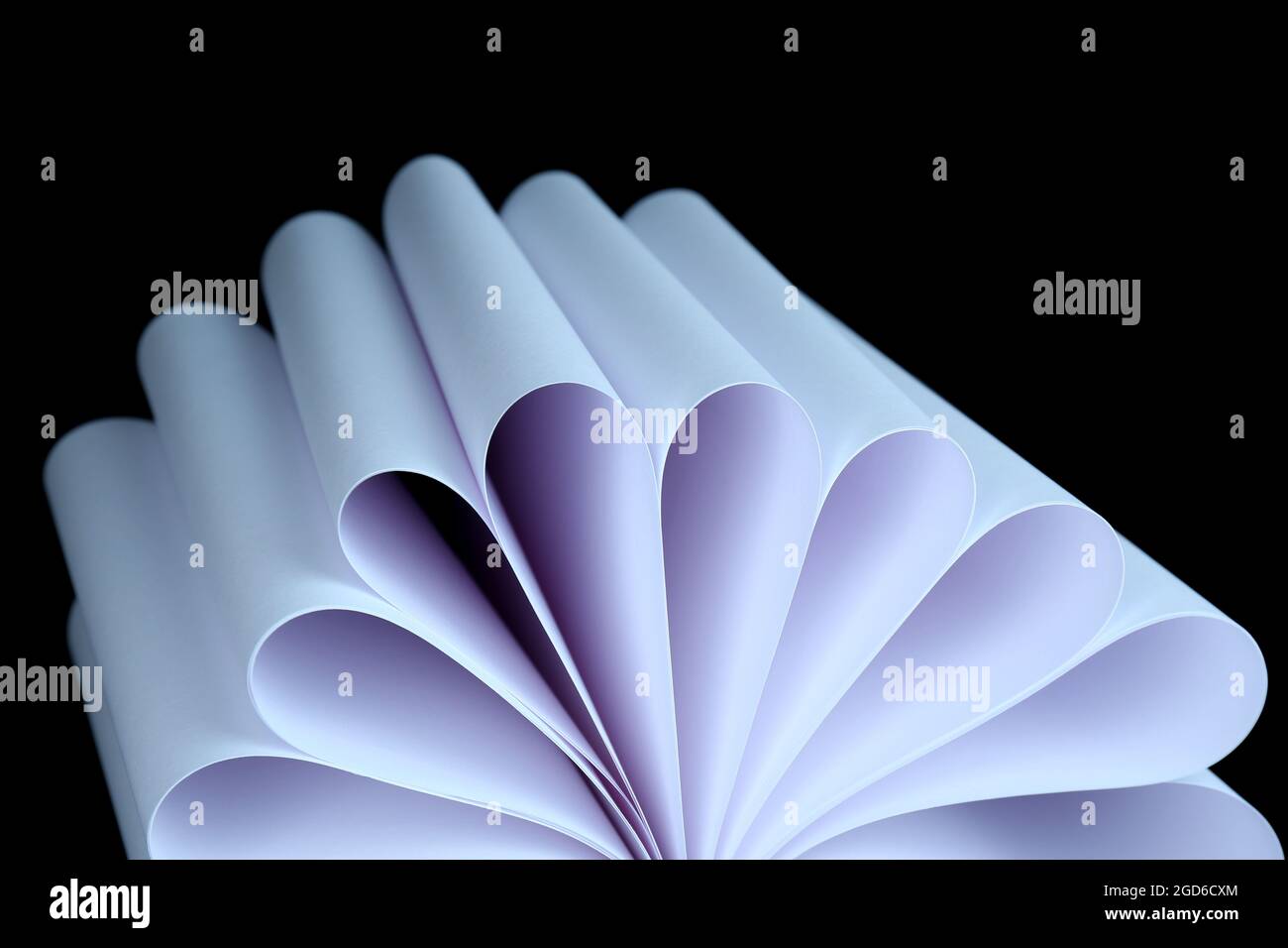 Abstract image of sheets white paper wave shape on black background ...