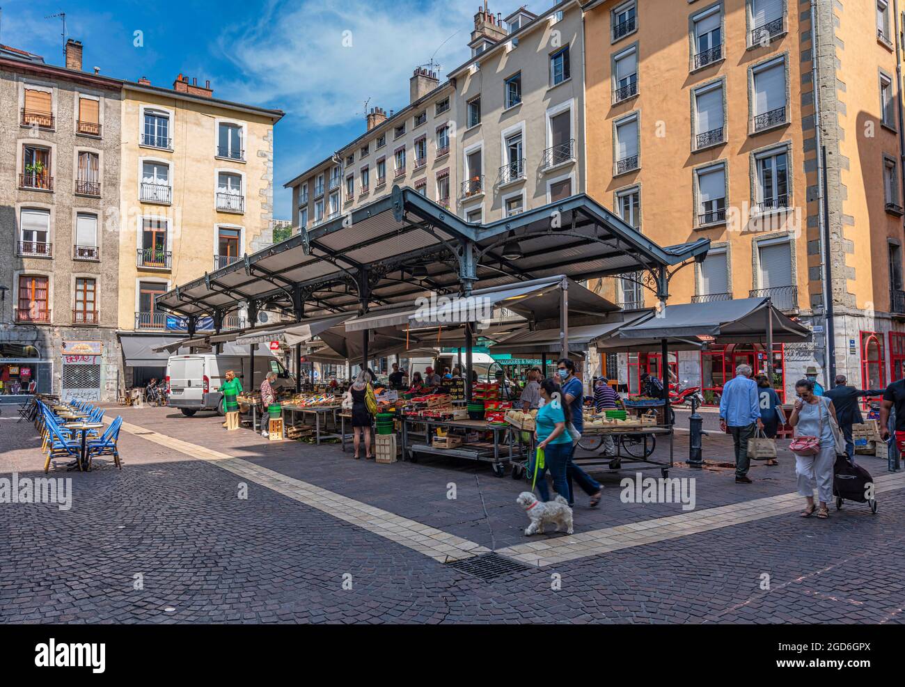 local fruit and vegetable stalls for sale in place aux herbes, market in the heart of the city of Grenoble. Grenoble, France Stock Photo