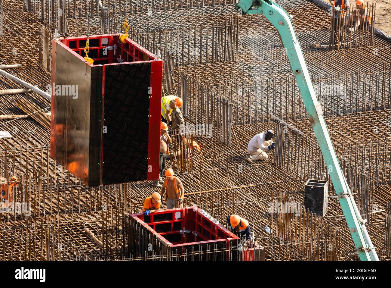 workers working with concrete irons in a construction site Stock Photo