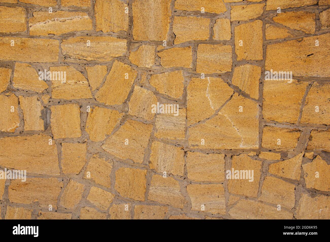 sandstone brick wall, background, close-up. Eco-friendly construction Stock Photo