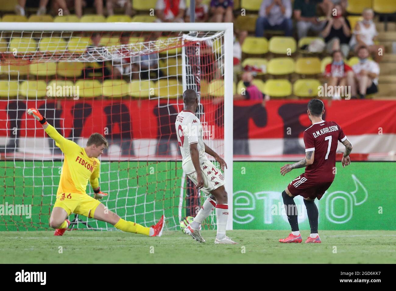 Monaco, Monaco, 10th August 2021. David Moberg-Karlsson of Sparta Prague  slides the ball past Alexander Nubel of AS Monaco to pull a goal back  during the UEFA Champions League match at Stade
