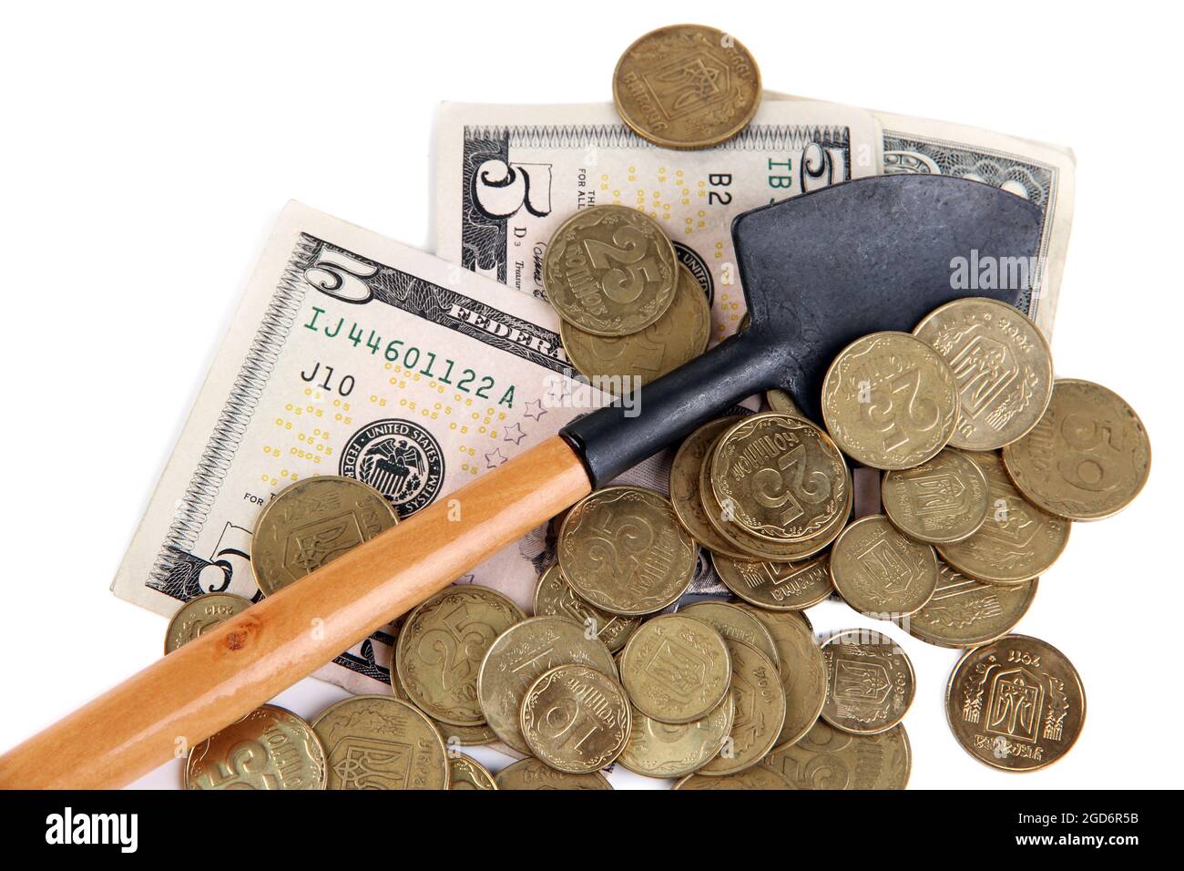 Money with shovel close up Stock Photo Alamy