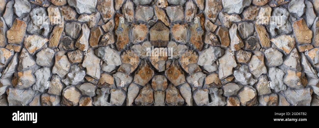 Background of rock stone wall. Stock Photo