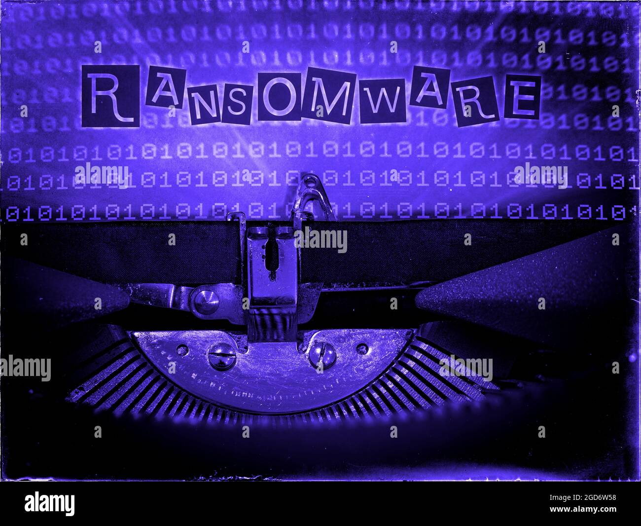 Ransomware, Mechanical Typewriter, Binary code background, Blue tone, Vintage distorted look, Ransom note typography Stock Photo