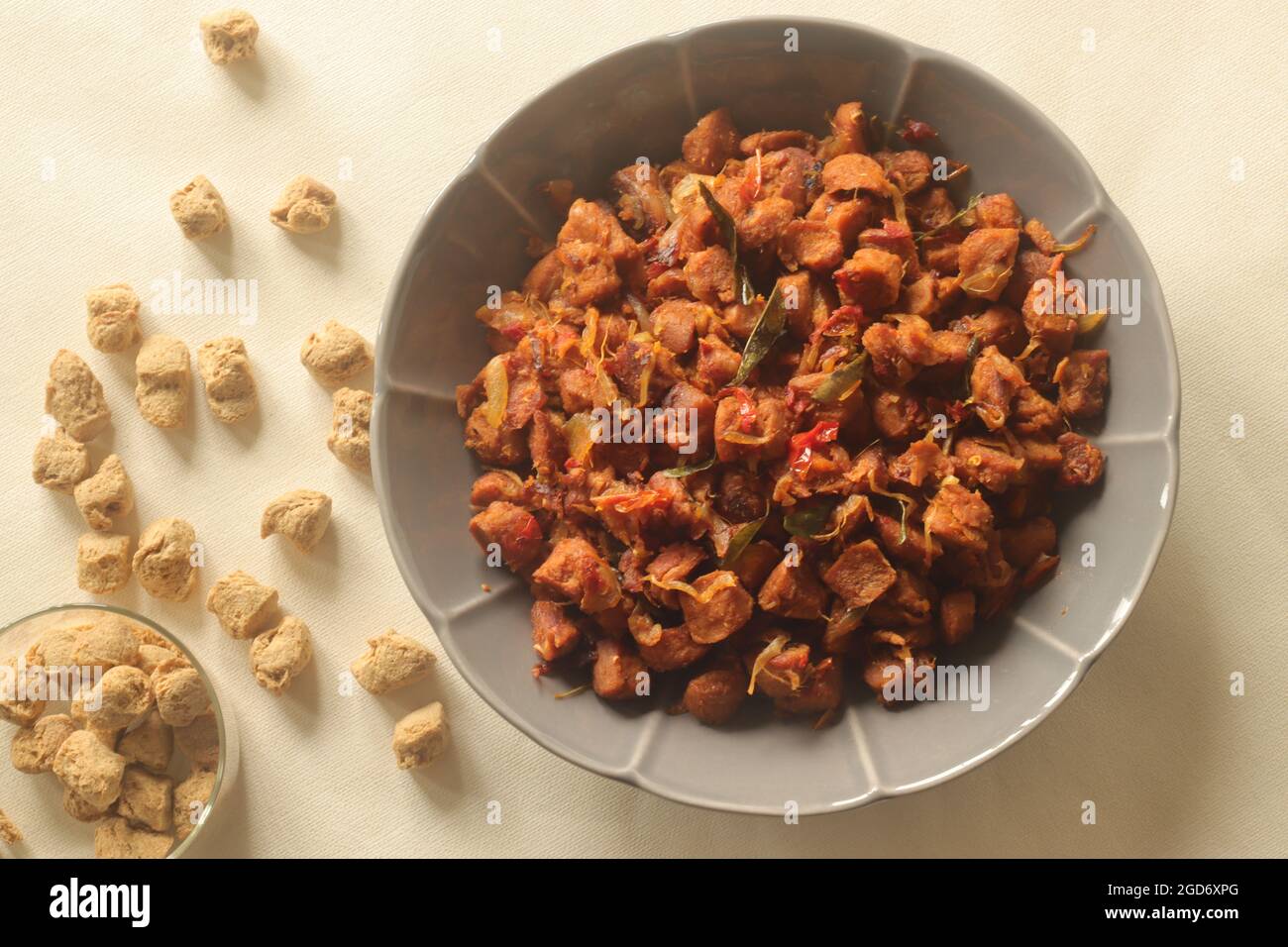 Dry roasted soya chunks with onions tomatoes and spices. Prepared with