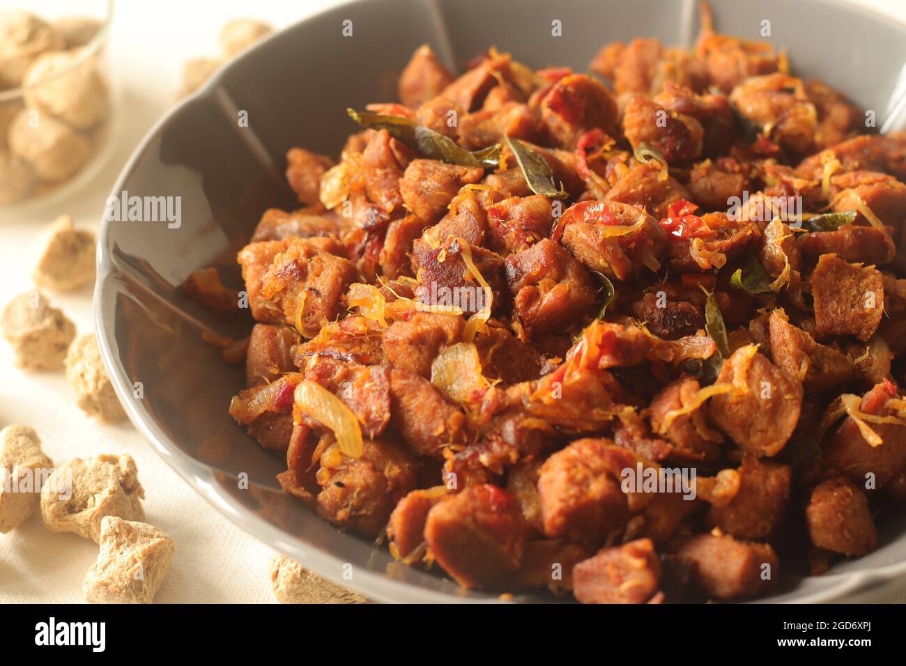 Dry roasted soya chunks with onions tomatoes and spices. Prepared with