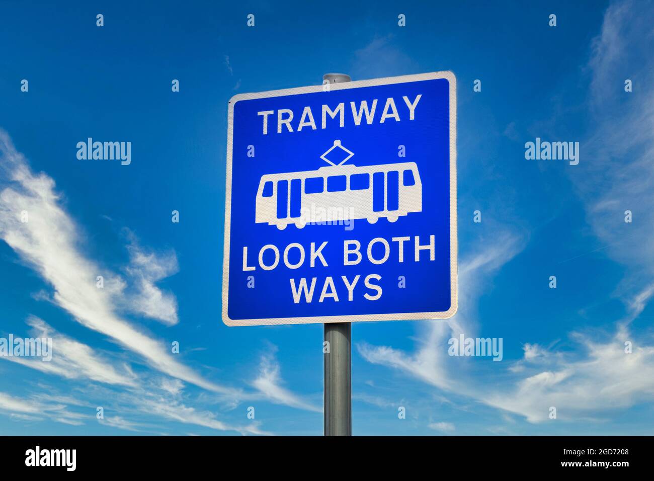 Tramway safety blue sign look both ways  Stock Photo