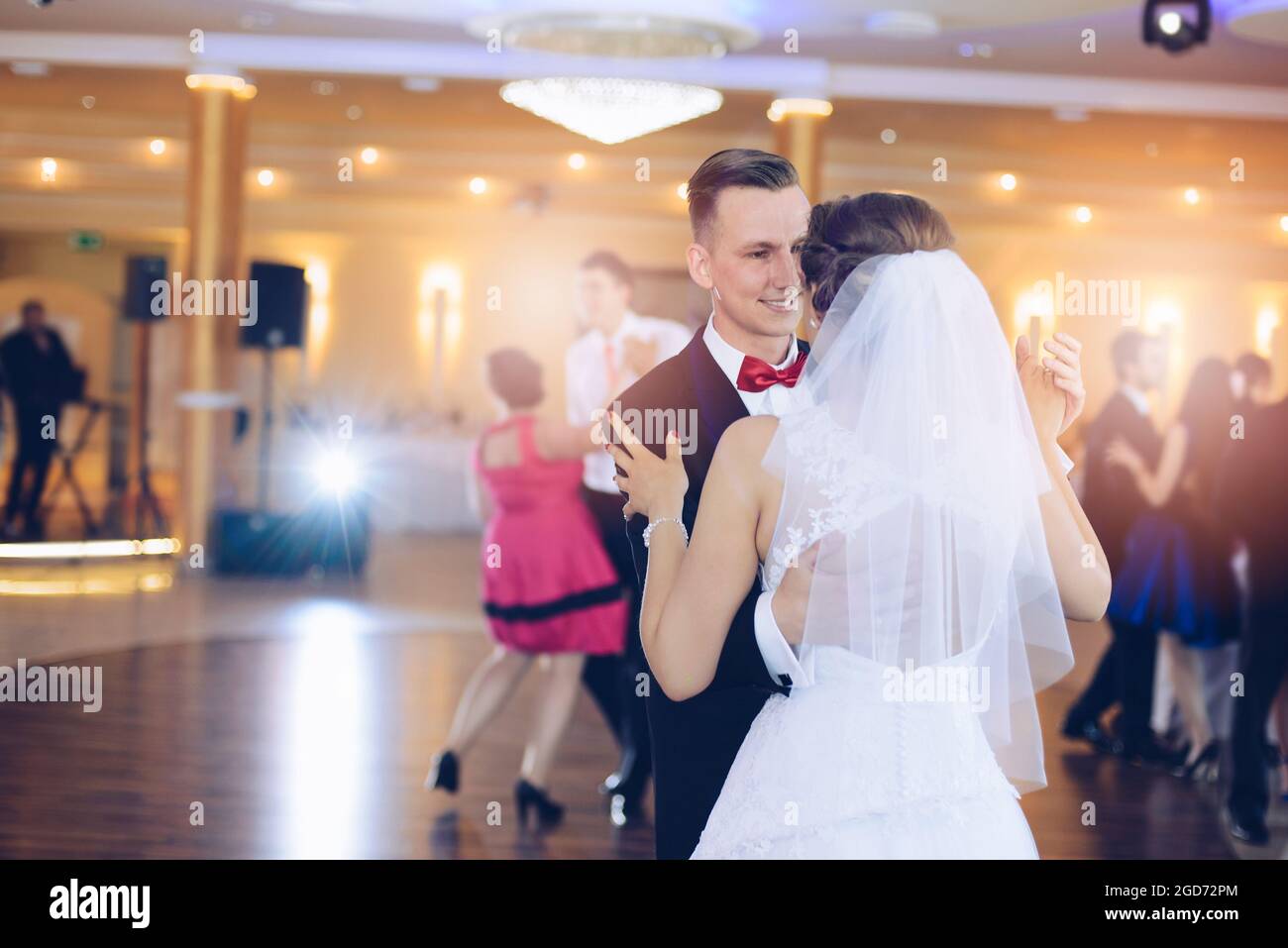 Happy wife and groom dancing at the wedding party Stock Photo - Alamy