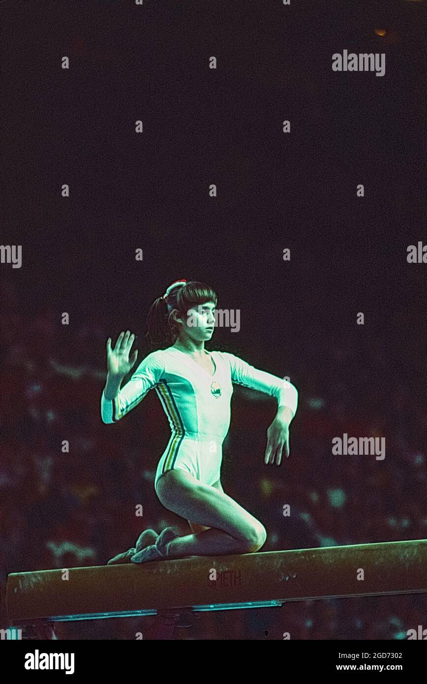 Nadia Comaneci (ROM) performs on the balance beam at the 1976 Olympic Summer Games, Montreal, Canada Stock Photo