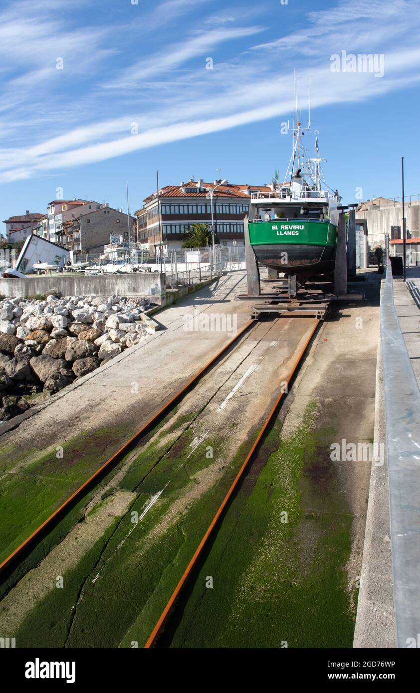 LLANES, SPAIN - January 12, 2020: 'El Reviru' fishing boat standing on the slip in the port of LLanes, Asturias, Spain. Stock Photo