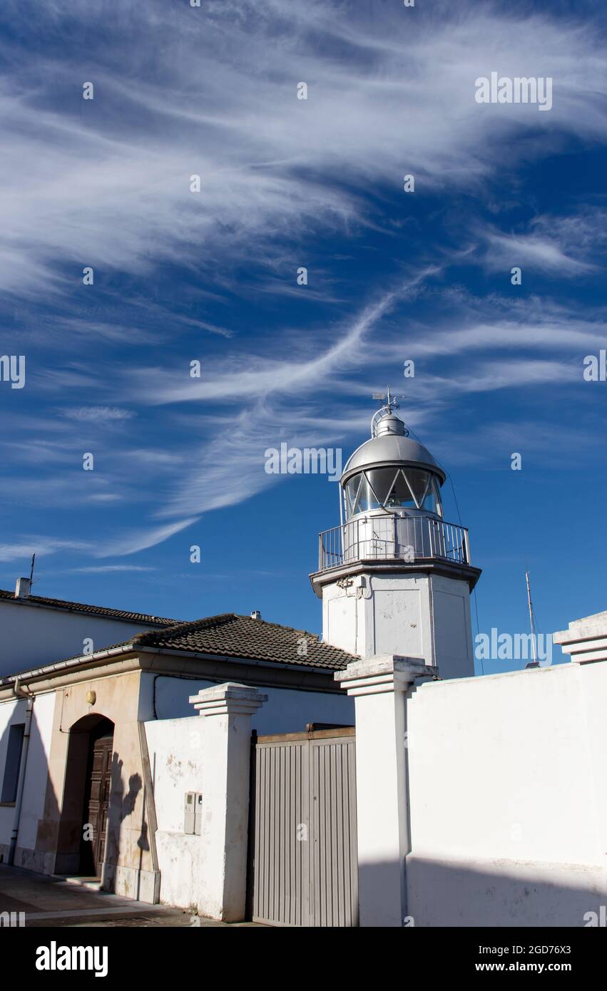 LLANES, SPAIN - January 12, 2020: Lighthouse in the port of LLanes, Asturias, Spain. Stock Photo