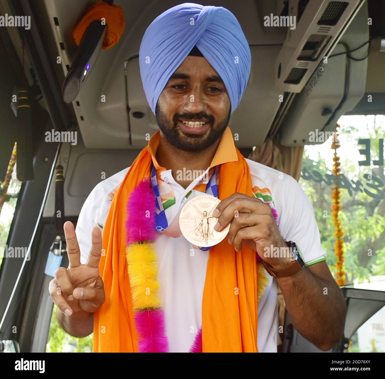 India. 11th Aug, 2021. AMRITSAR, INDIA - AUGUST 11: Indian men's hockey team captain Manpreet Singh Dhillon after his arrival at Sri Guru Ram Dass Jee International Airport on August 11, 2021 in Amritsar, India. The Indian Men's Hockey Team made history by winning their first Olympic Medal (Bronze) in 41 years. (Photo by Sameer Sehgal/Hindustan Times/Sipa USA) Credit: Sipa USA/Alamy Live News Stock Photo