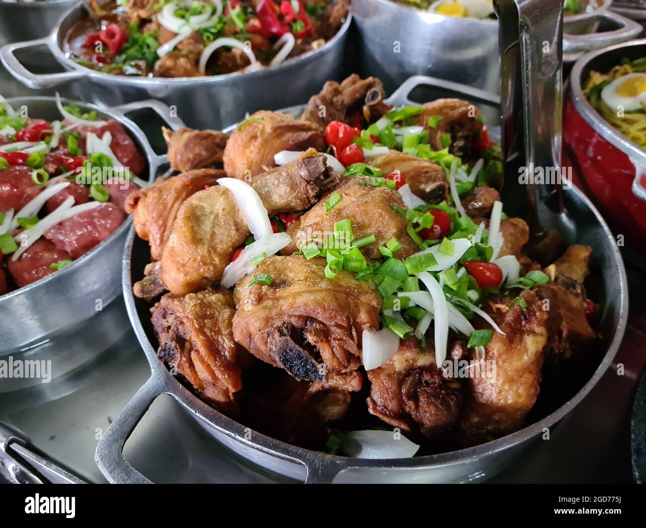 Fried chicken served in aluminum pan Stock Photo Alamy