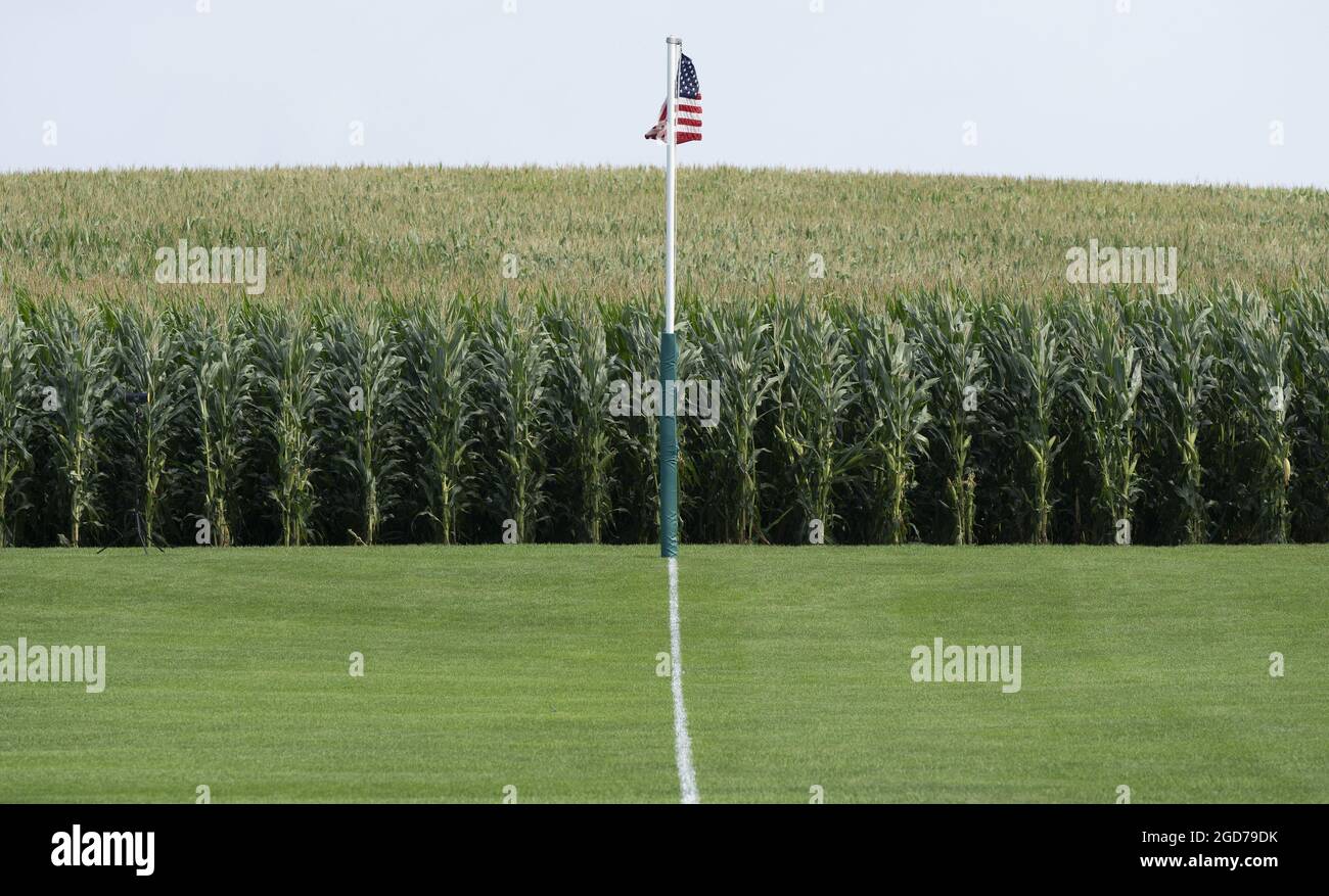 Dyersville, United States. 11th Aug, 2021. An American flag flies down the right field line in the cornfield ballpark depicted in the movie 'Field of Dreams' near Dyersville, Iowa on Wednesday, August 11, 2021. The New York Yankees and Chicago White Sox will play a MLB regular season game on an adjacent ballpark in the cornfields of Iowa on Thursday, August 12th. Photo by Pat Benic/UPI Credit: UPI/Alamy Live News Stock Photo
