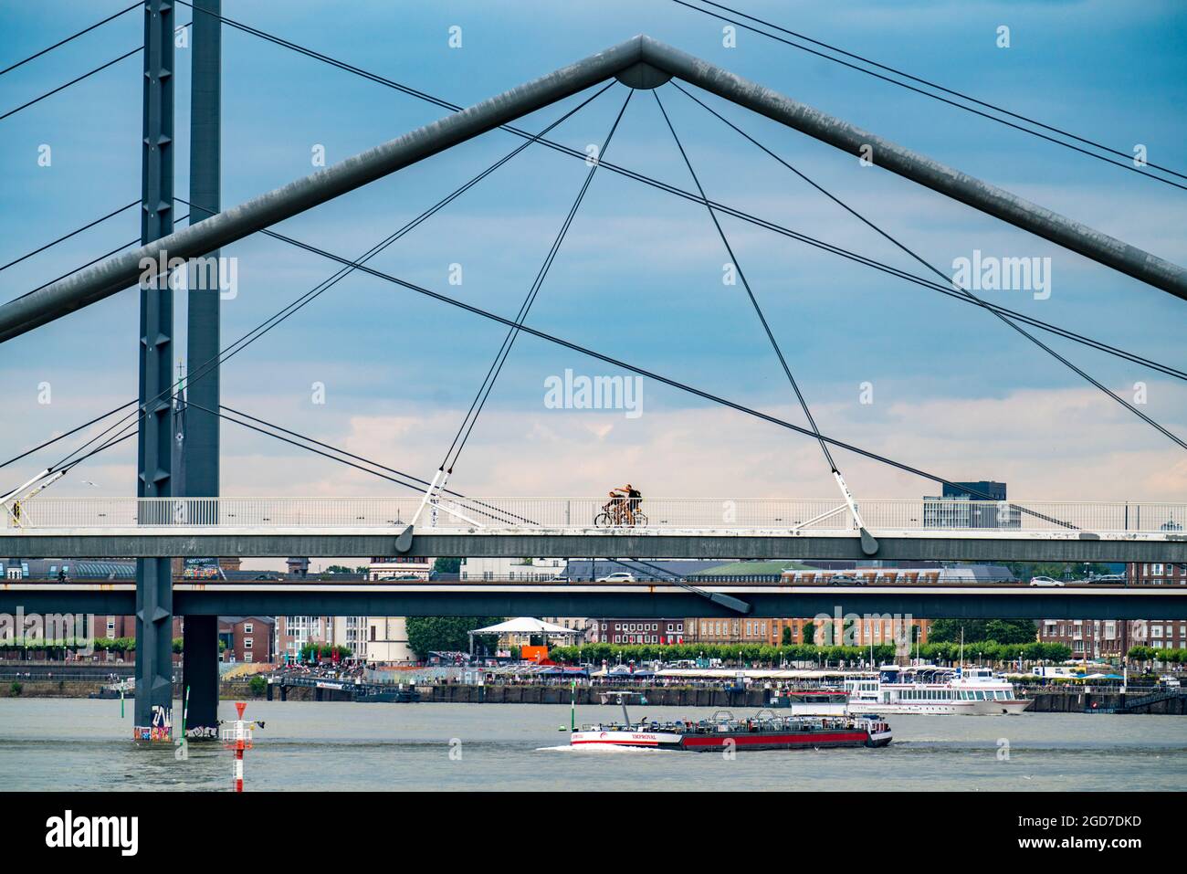 Footbridge over the media harbour, harbour entrance and Rhine bridge, over the Rhine near Duesseldorf, Rhineland, North Rhine-Westphalia, Germany, Eur Stock Photo