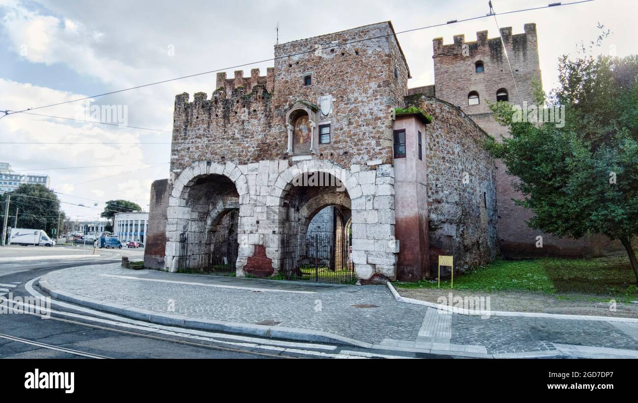 Ancient majestic well preserved Porta San Paolo gate one of the southern gates of the Aurelian Walls that protected  Rome located at Piazzale Ostiense Stock Photo