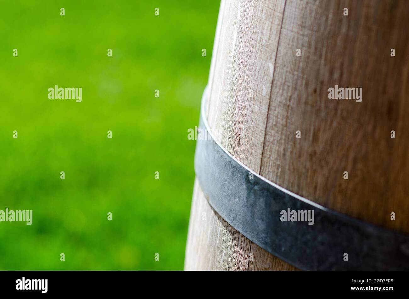 wooden barrel: detail, precious woods are always used to age, transport, store products such as wine, beer and spirits. Stock Photo