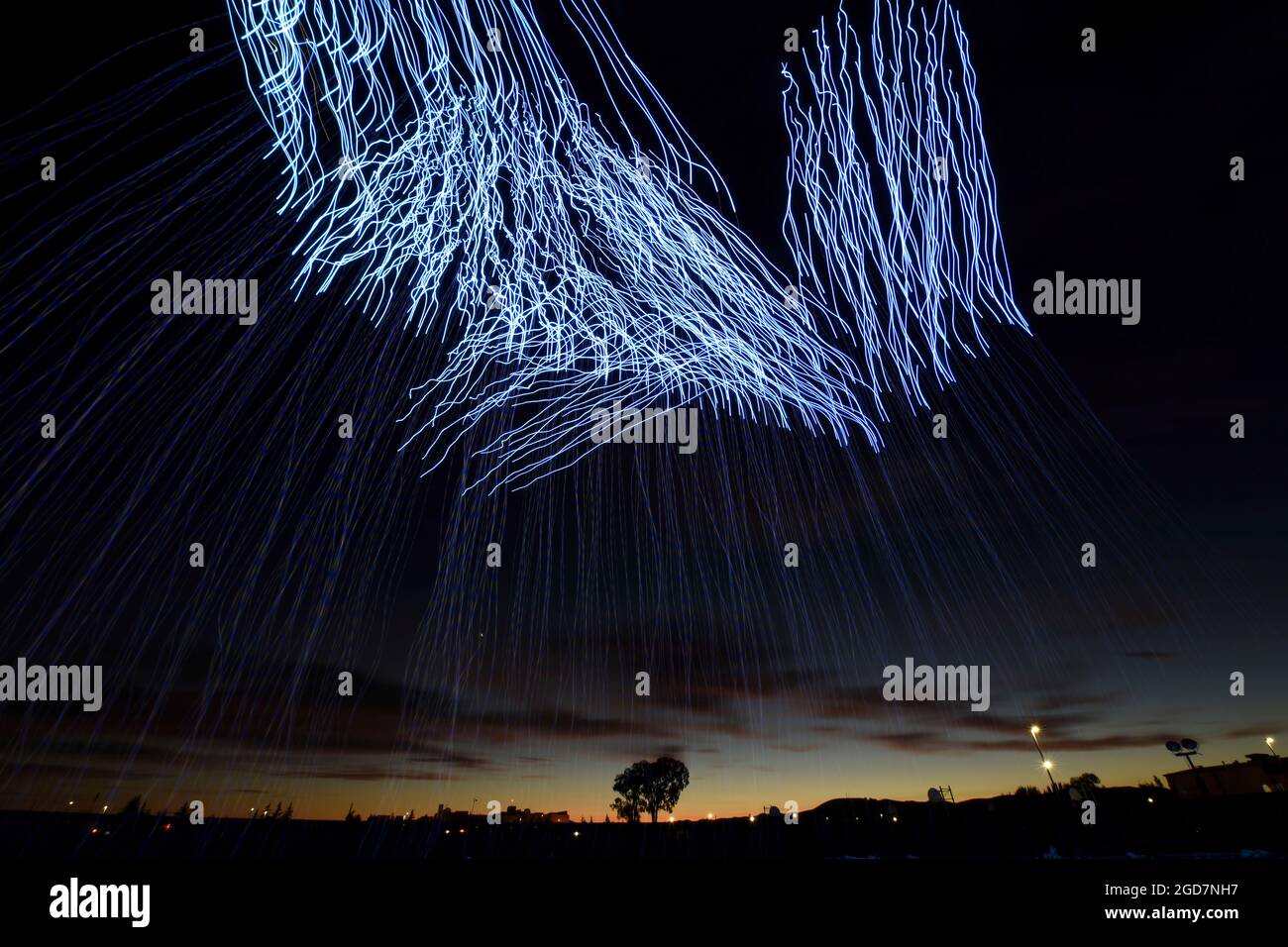 A view of Travis Air Force Base, Calif.'s Intel Shooting Star Drone light show where Travis families were shown the choreographed capabilities of over 500 drones during an Independence Day celebration July 5, 2018. The drones conducted a show consisting of various designs meant to highlight both the U.S. Air Force's and Travis' history. (U.S. Air Force photo by Airman 1st Class Christian Conrad) Stock Photo