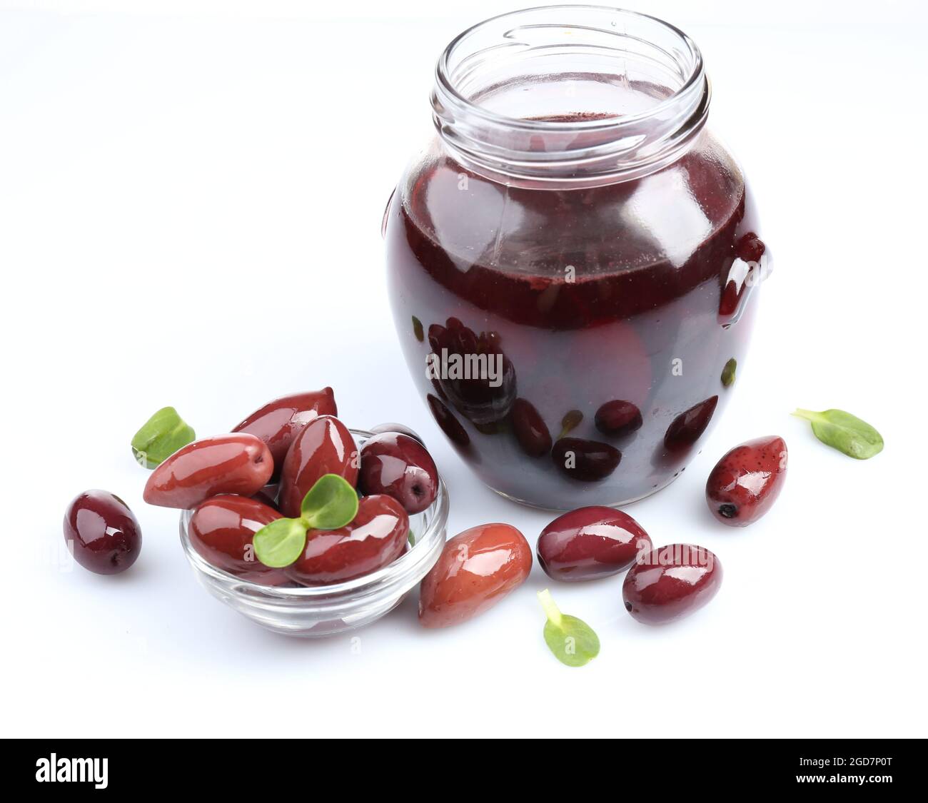 Black olives in glass jar, isolated on white Stock Photo Alamy