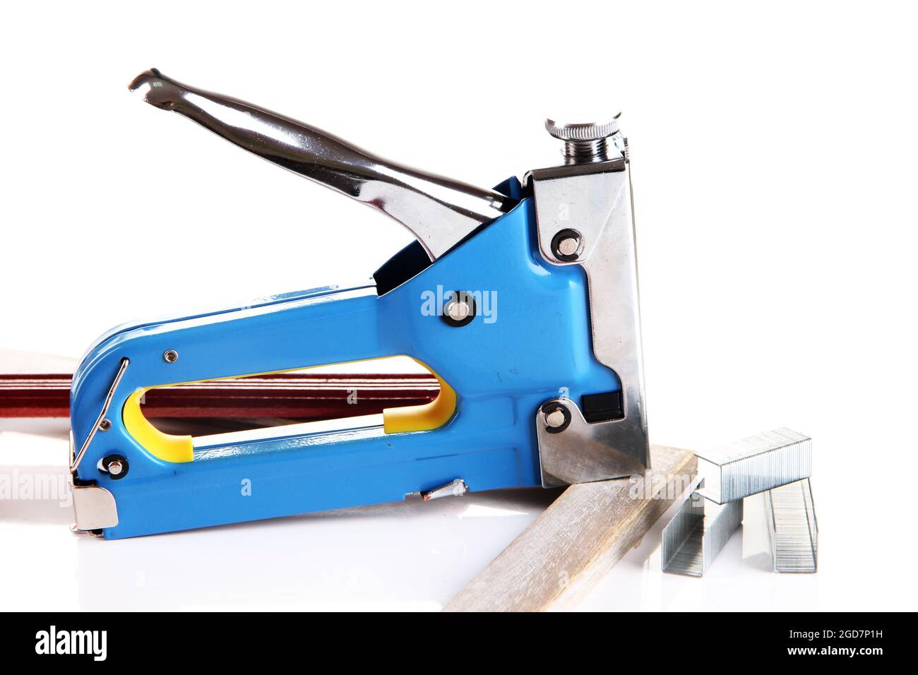 Construction stapler and wooden frames isolated on white Stock Photo