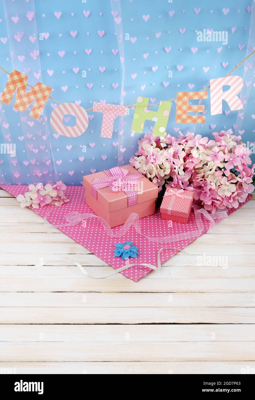 Mother- lettering of handmade paper letters on blue background Stock ...