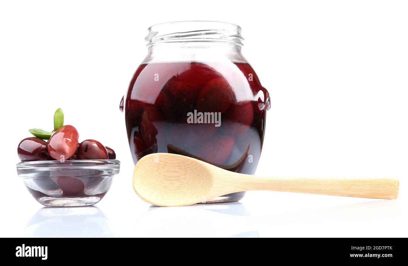 Black olives in glass jar, isolated on white Stock Photo Alamy