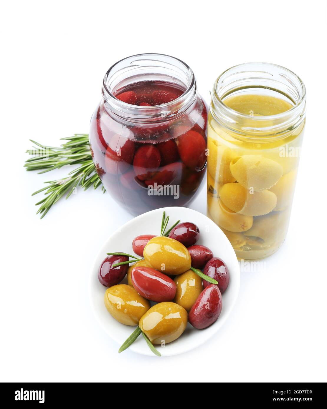 Tasty olives in glass jars, isolated on white Stock Photo Alamy