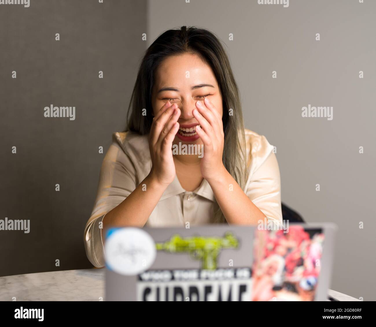 Young Asian Female Data Scientist Enjoying a Work Meeting Stock Photo