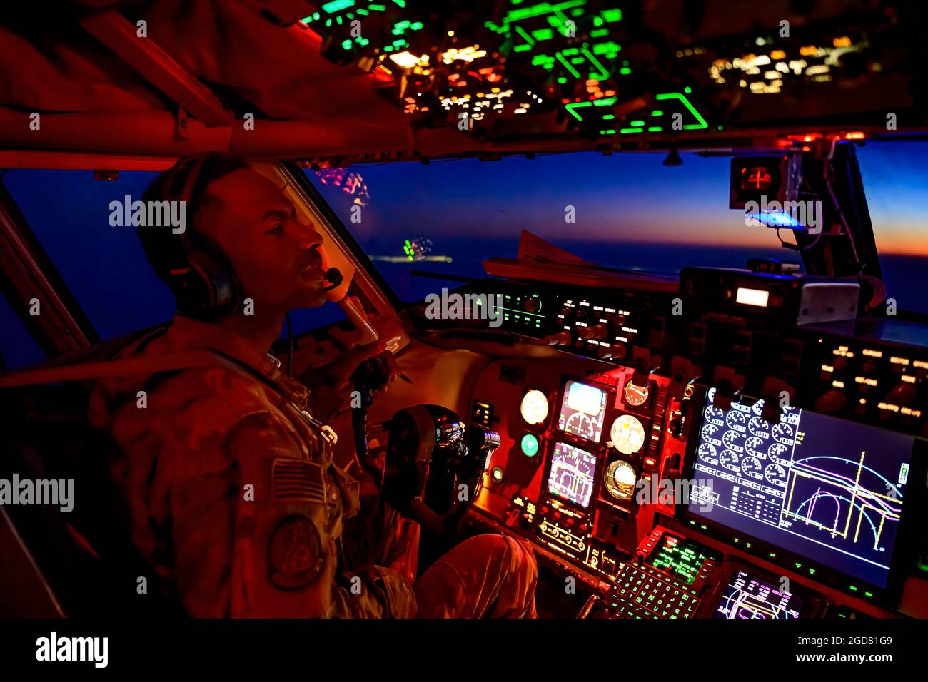 A KC-135 Stratotanker aircraft pilot from the 350th Expeditionary Aerial Refueling Squadron prepares to refuel F/A-18D Hornet aircraft during a mission supporting a dynamic force employment over the U.S. Central Command area of responsibility, May 18, 2021. DFEs enhance Central Command’s ability to deter aggression and promote security and stability within the area of responsibility. (U.S. Air Force photo by Tech. Sgt. Robert Harnden) Stock Photo